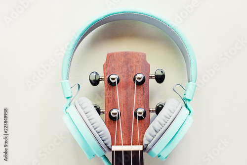 Ukulele with green headphon...