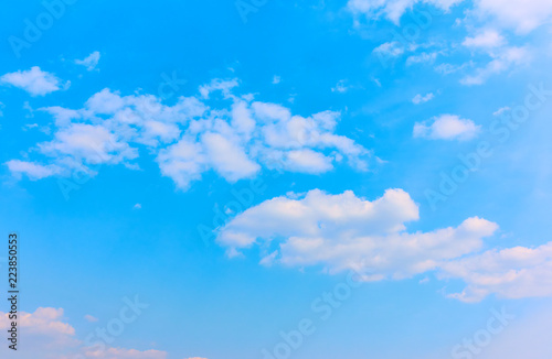 Light blue sky with white clouds