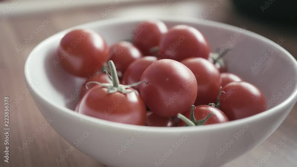 remove the green strands from the tomatoes, close-up remove the green strands from the tomatoes, close-up