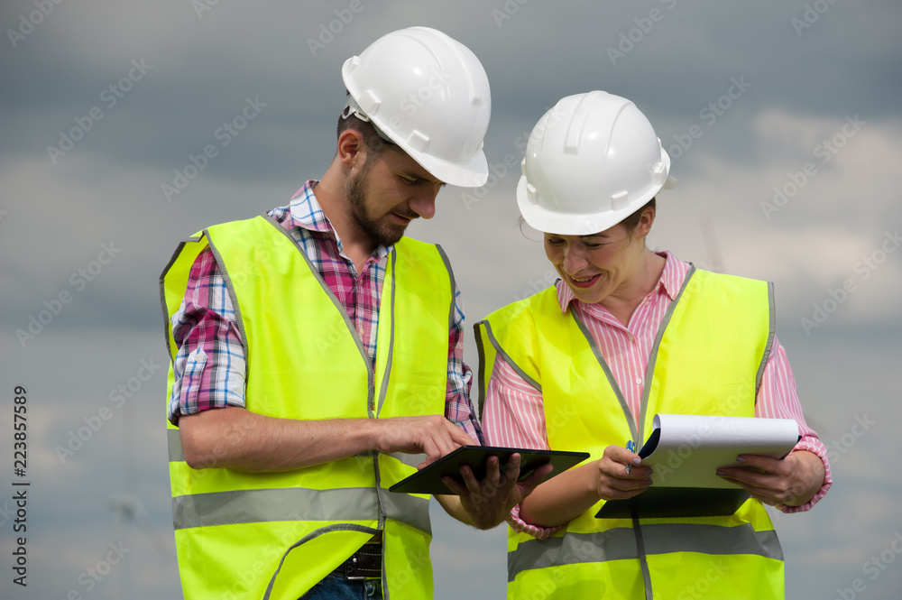Concept of engineers and windmills Concept of engineers and windmills