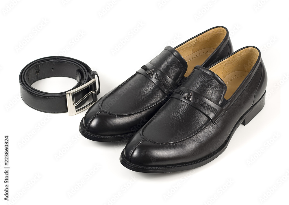 The black man's shoes and accessories isolated on white and black background. The black man's shoes and accessories isolated on white and black background.