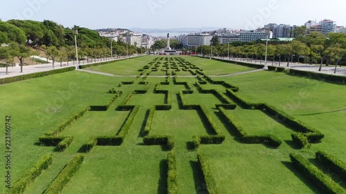 Aerial bird view footage of Eduardo VII Park a public place in Lisbon Portugal the space occupies an area of 26 hectares to north of Marquis of Pombal Square in the centre of the city 4k quality photo