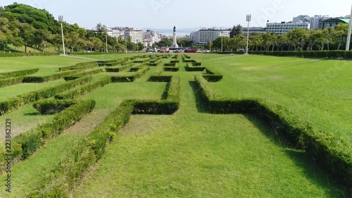 Low altitude aerial footage of Eduardo VII Park a public place in Lisbon Portugal the space occupies an area of 26 hectares to north of Marquis of Pombal Square in the centre of the city 4k quality photo