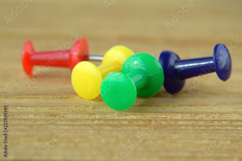Stationery buttons on wooden background Shallow depth of field © Kapitalist63