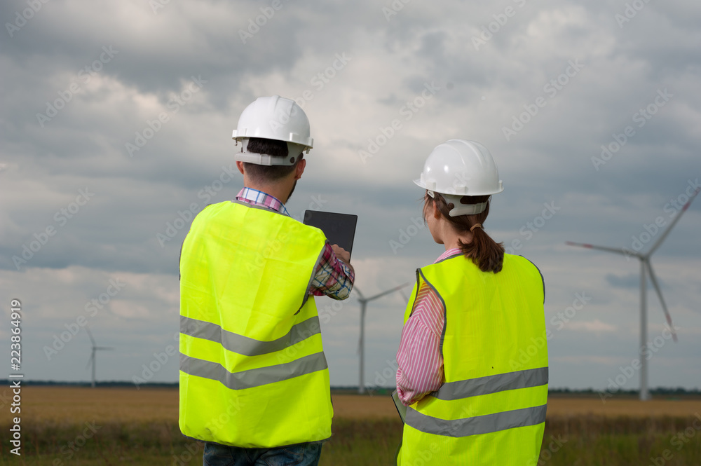 Concept of engineers and windmills Concept of engineers and windmills