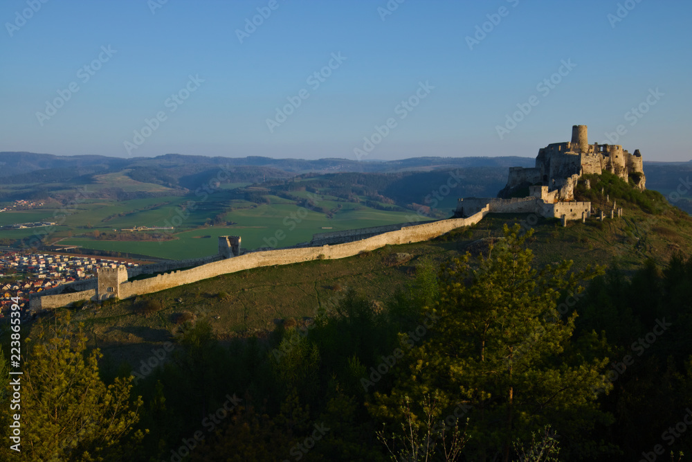 A southern view of the Spis castle and its fortification in the morning in early spring with clear sky