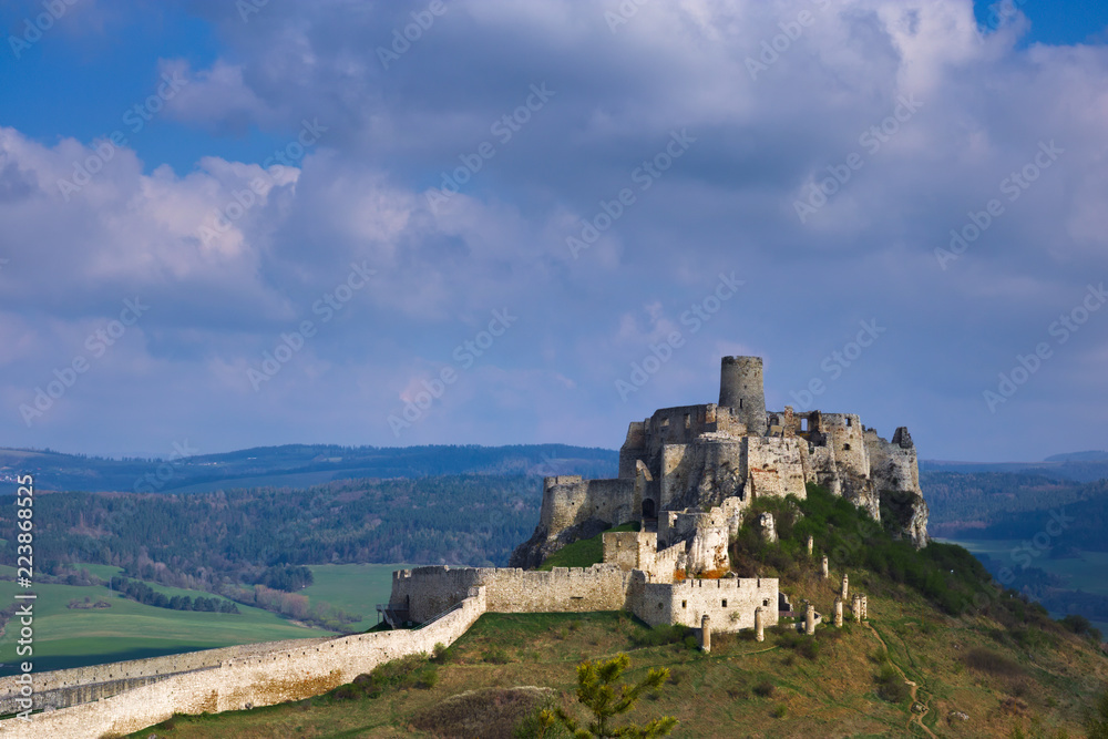 A southern view of the palace part of the Spis castle in the morning in early spring with cloudy sky