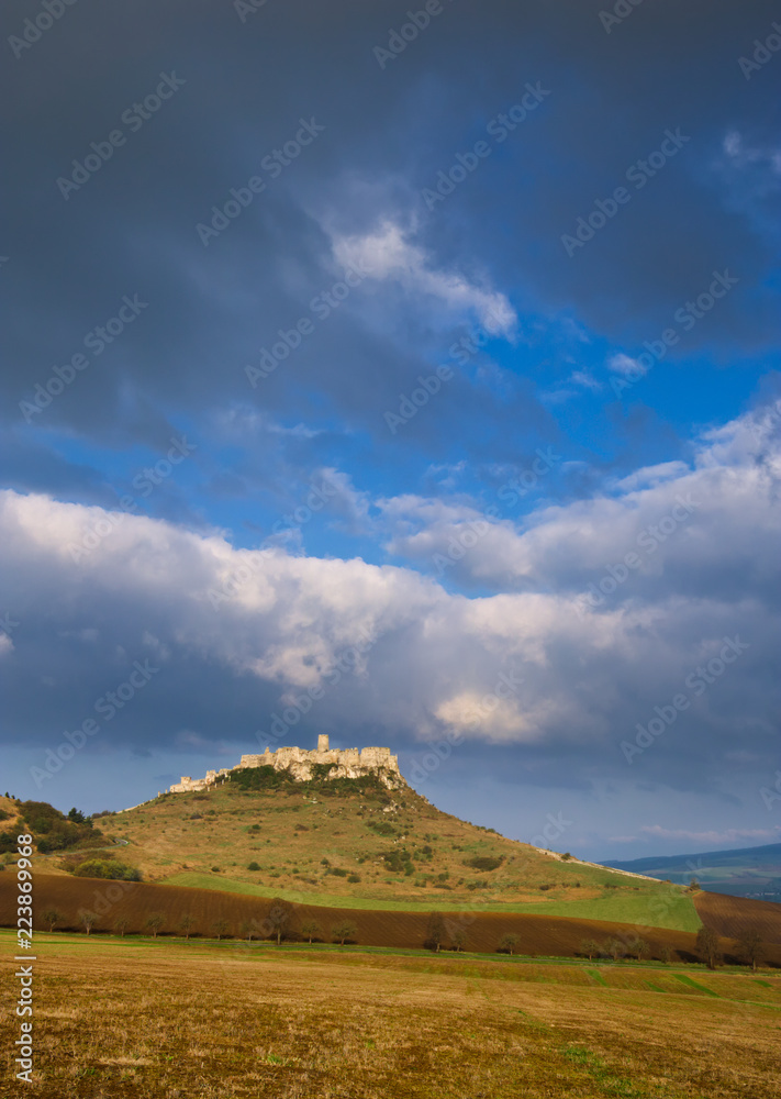 An eastern view of the Spis castle at sunrise of early spring An eastern view of the Spis castle at sunrise of early spring