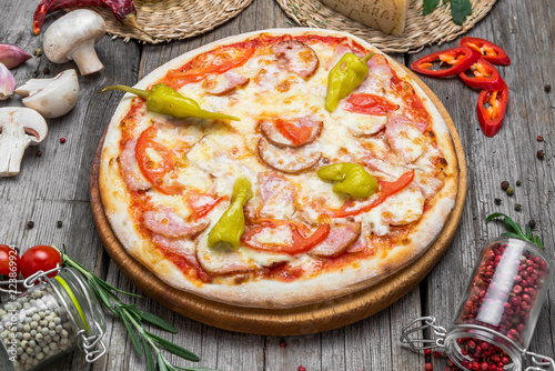 Pizza with tomatoes, mozzarella cheese. Delicious italian pizza