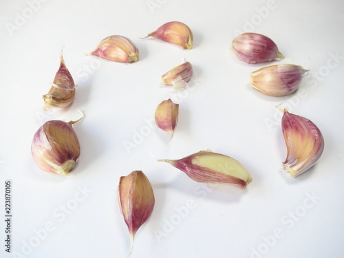 Garlic cloves on white background close-up