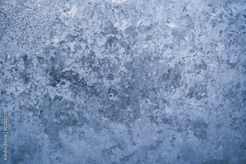 Frosty pattern on winter glass pane. Frosty pattern on winter glass pane.