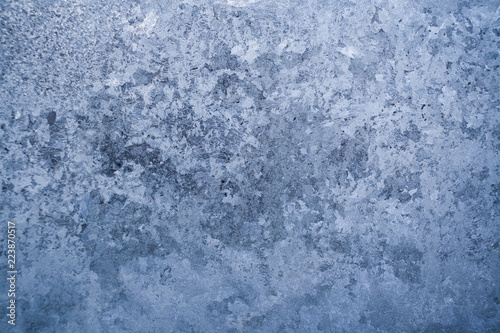 Frosty pattern on winter glass pane.  © SeNata