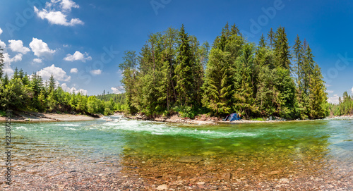 Fototapeta Naklejka Na Ścianę i Meble -  Panorama of wild river and tent inTatras mountains