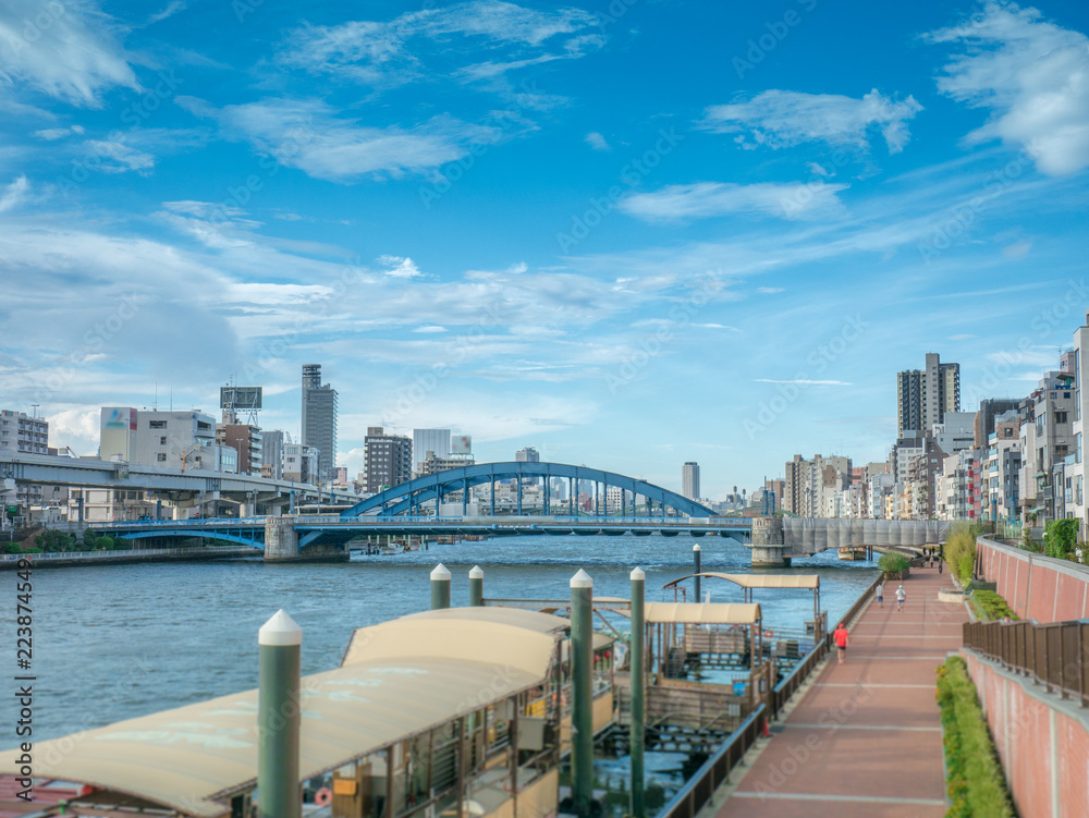 City view of bridge at Sumida river near Asakusa in Tokyo.