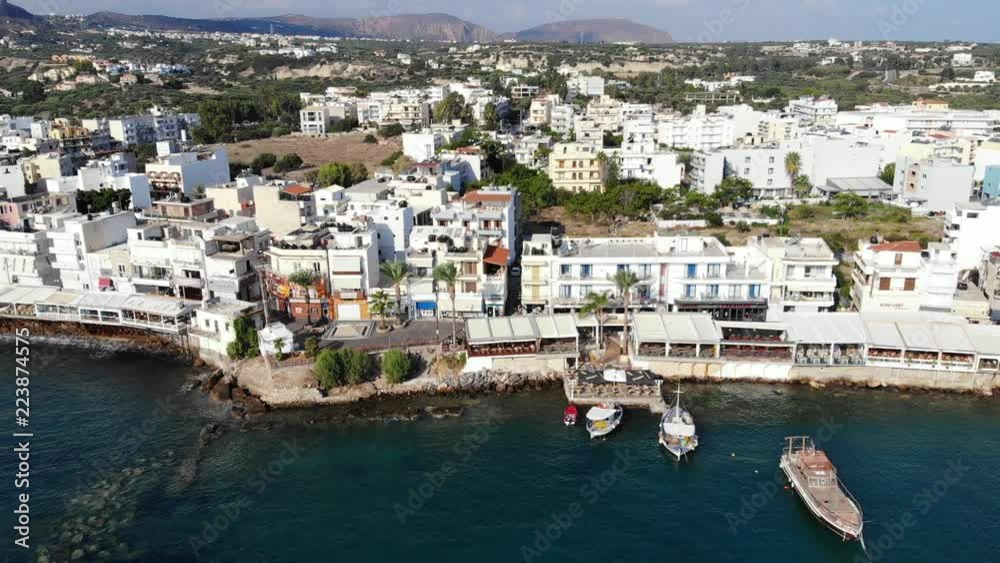 Aerial panorama on greek city, blue sea and boats, Crete Aerial panorama on greek city, blue sea and boats, Crete
