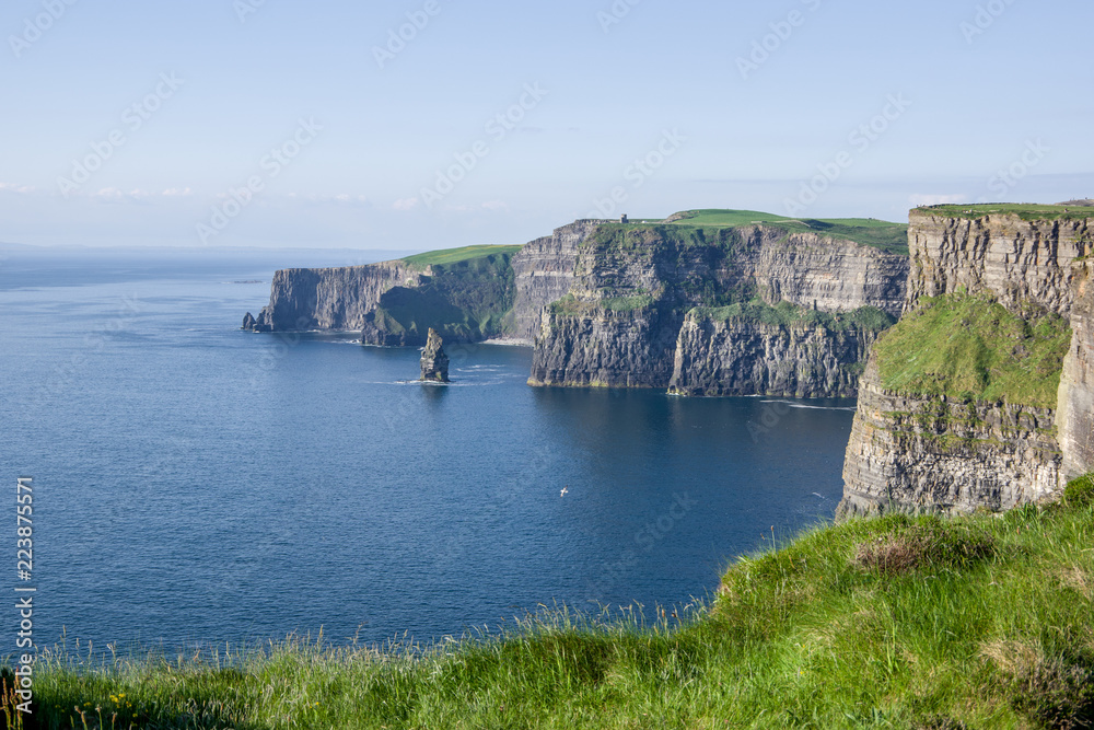 Landscape view of Cliffs of Moher with clear day sky. County Clare, Ireland. Landscape view of Cliffs of Moher with clear day sky. County Clare, Ireland.