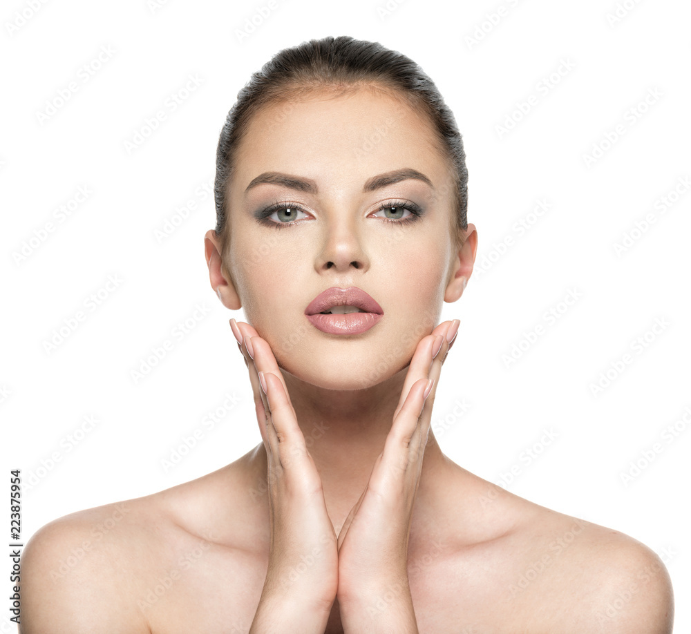 Beautiful woman cares for the skin face - isolated on white Beautiful woman cares for the skin face - isolated on white