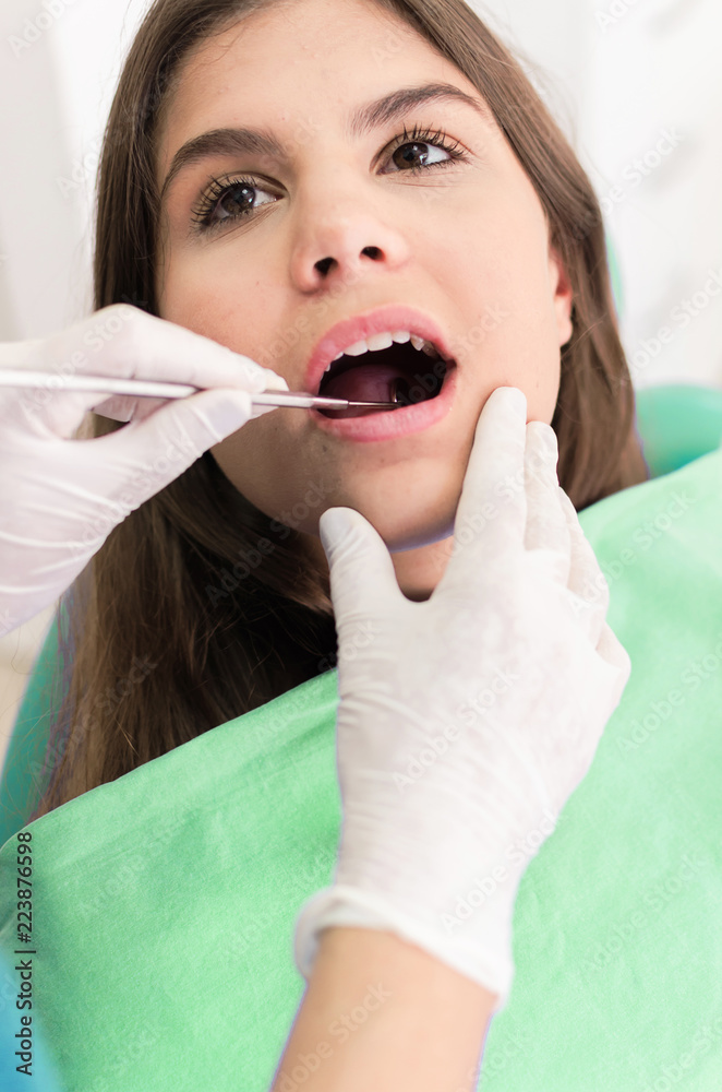 Young patient having control at dentist's office Young patient having control at dentist's office