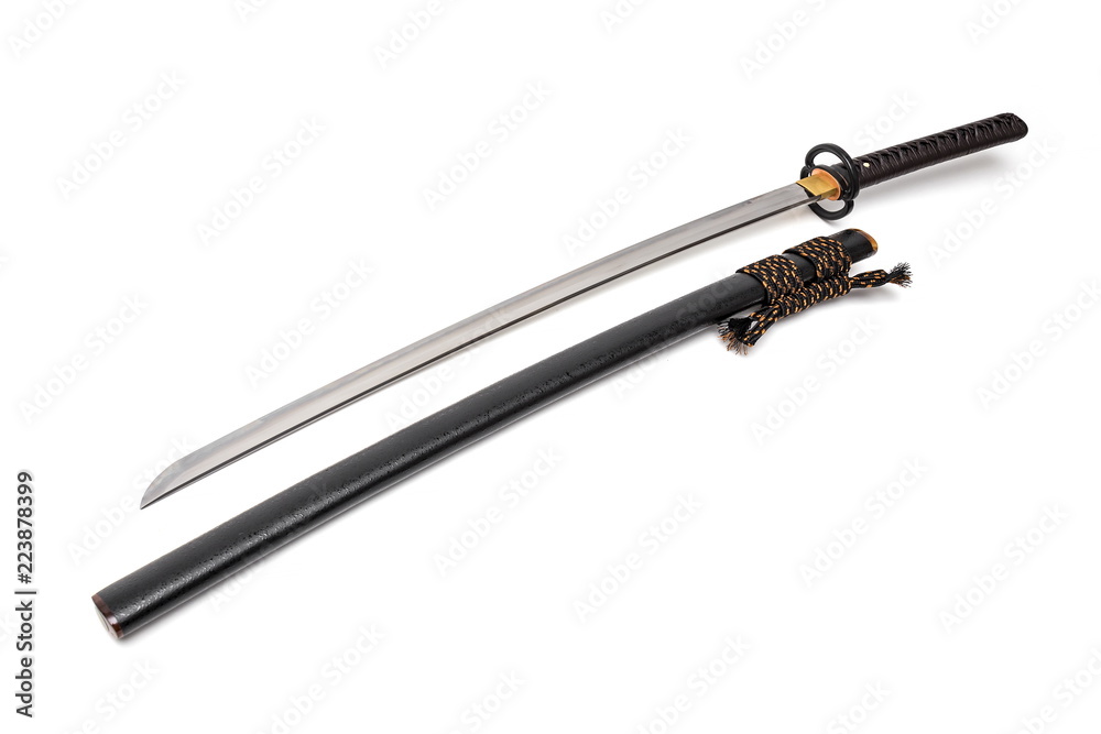 Brown leather cord tie on grip Japanese sword steel fitting and black scabbard on white background. Brown leather cord tie on grip Japanese sword steel fitting and black scabbard on white background.