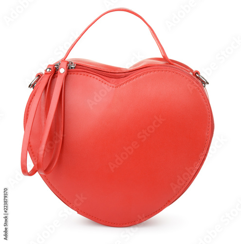 Fotografie Red heart-shaped leather handbag