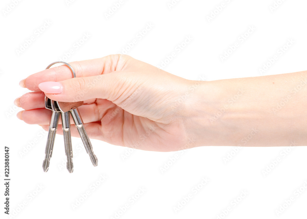 Keys in hand on white background isolation Keys in hand on white background isolation