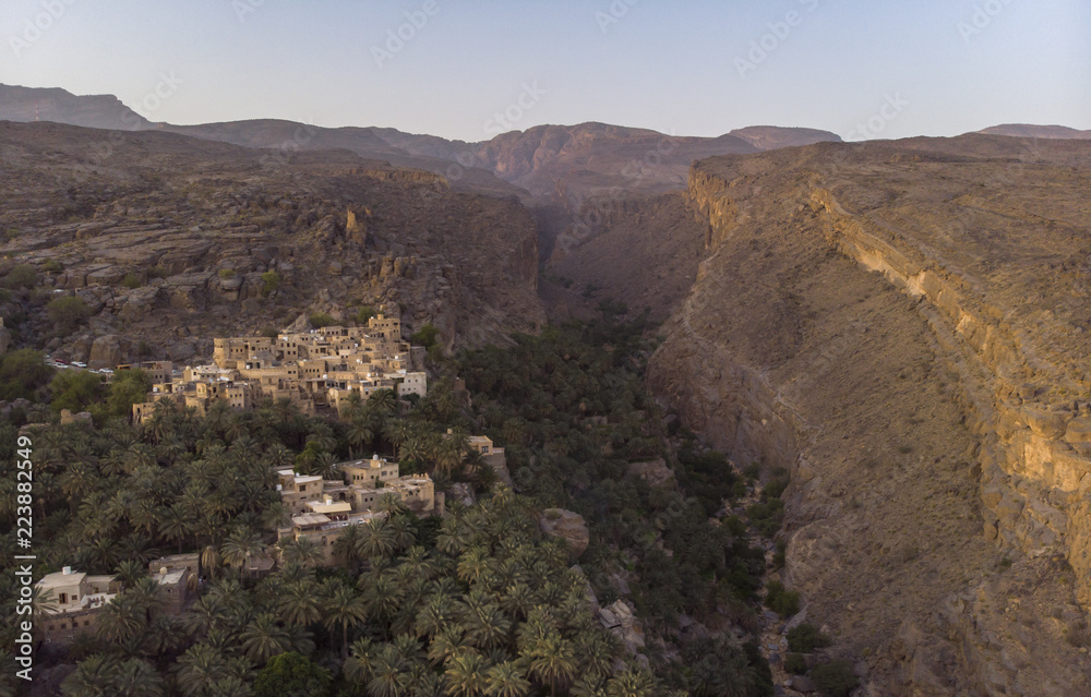 aerial view of Misfat al Abriyeen village in Hajjar Mountains, Oman aerial view of Misfat al Abriyeen village in Hajjar Mountains, Oman