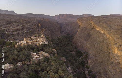 aerial view of Misfat al Abriyeen village in Hajjar Mountains, Oman photo