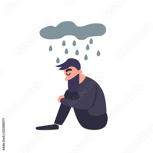 Sad man sits in the rain. Sadness dreary lonely depressed young man thinks about the bad. Unhappy guy. Mental disorder