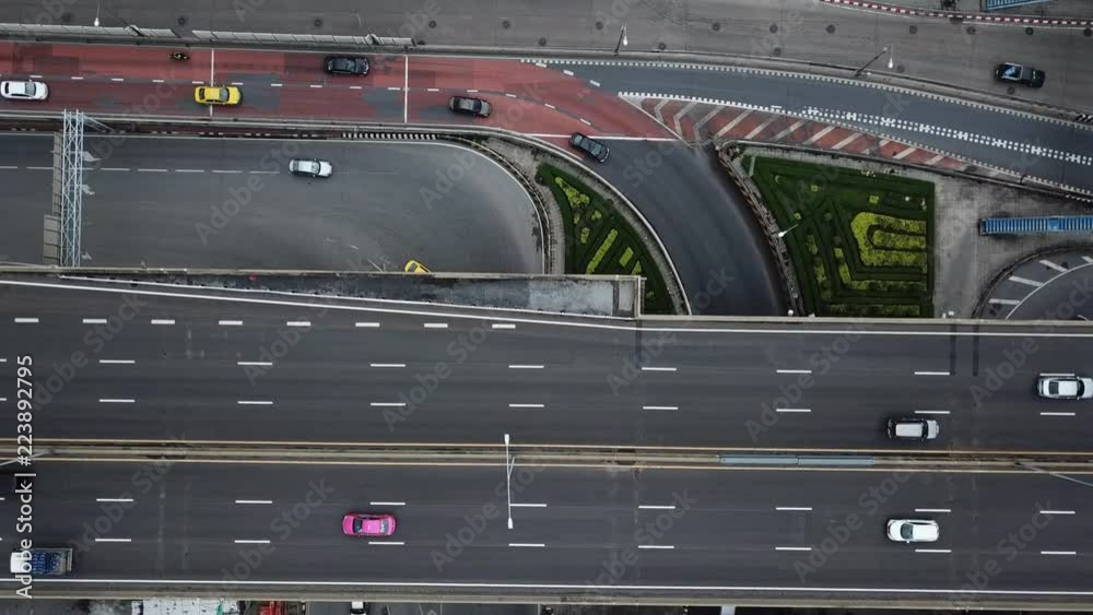 Aerial view of traffic on the road and highway in Bangkok, Thailand. Taken by drone. Aerial view of traffic on the road and highway in Bangkok, Thailand. Taken by drone.