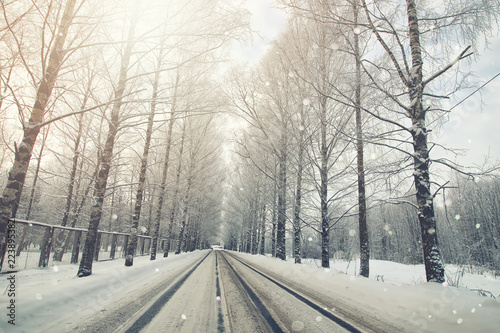  road in the snowy storm winter