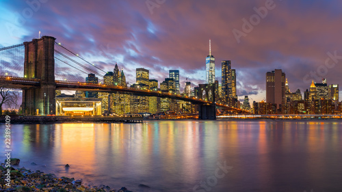 Brooklyn bridge and Manhattan after sunset  New York City