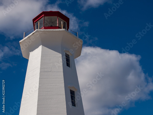 Peggy's Cove Lighthouse, summer sun, closeup, no people.