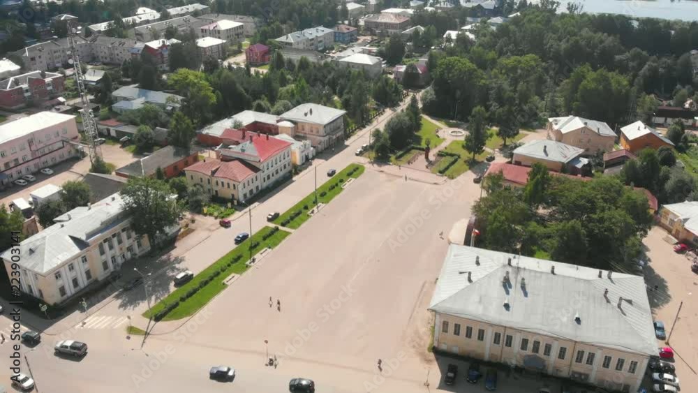 The flight of the camera over the central square of Totma, a sunny summer day and a blue sky.