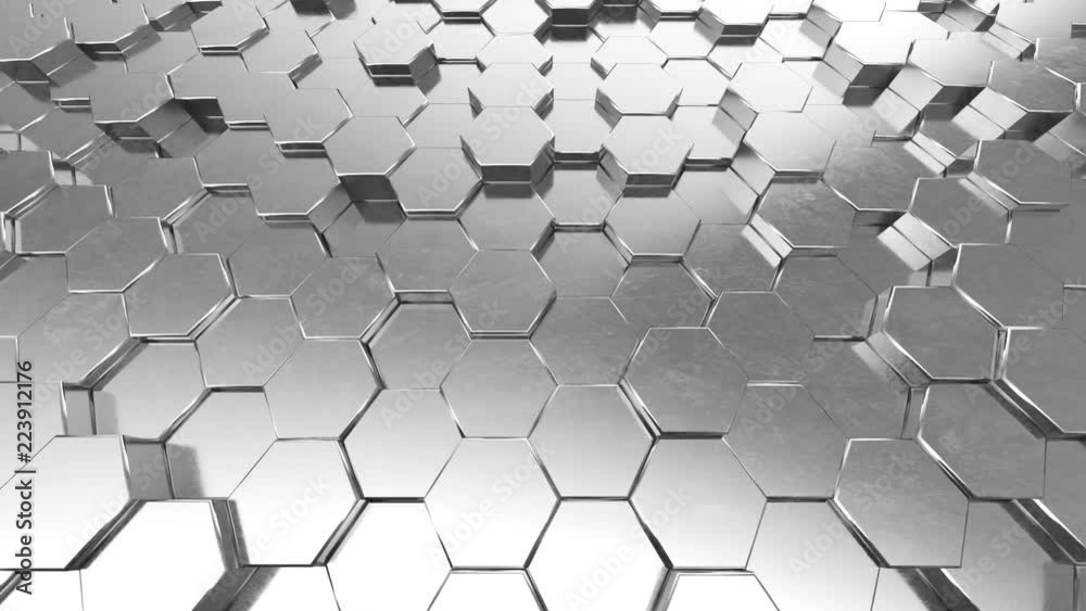 Abstract looping motion background texture of metallic hexagons. Abstract looping motion background texture of metallic hexagons.
