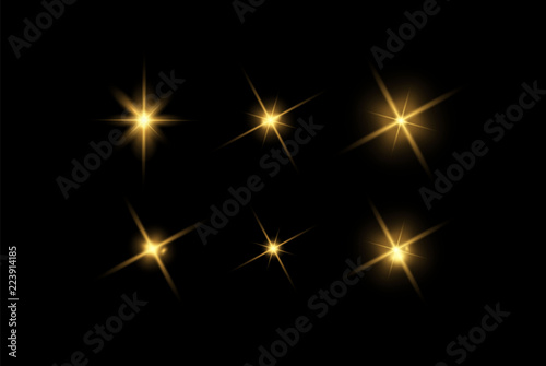 Vector glowing light effects set. Stars bursts with sparkles elements for any image. Transparent stars. photo