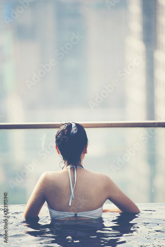 Young woman in a roof top s...