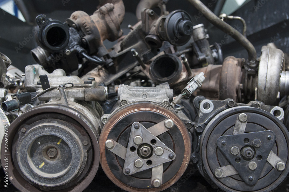 Fototapeta premium bunch of old car parts, generators
