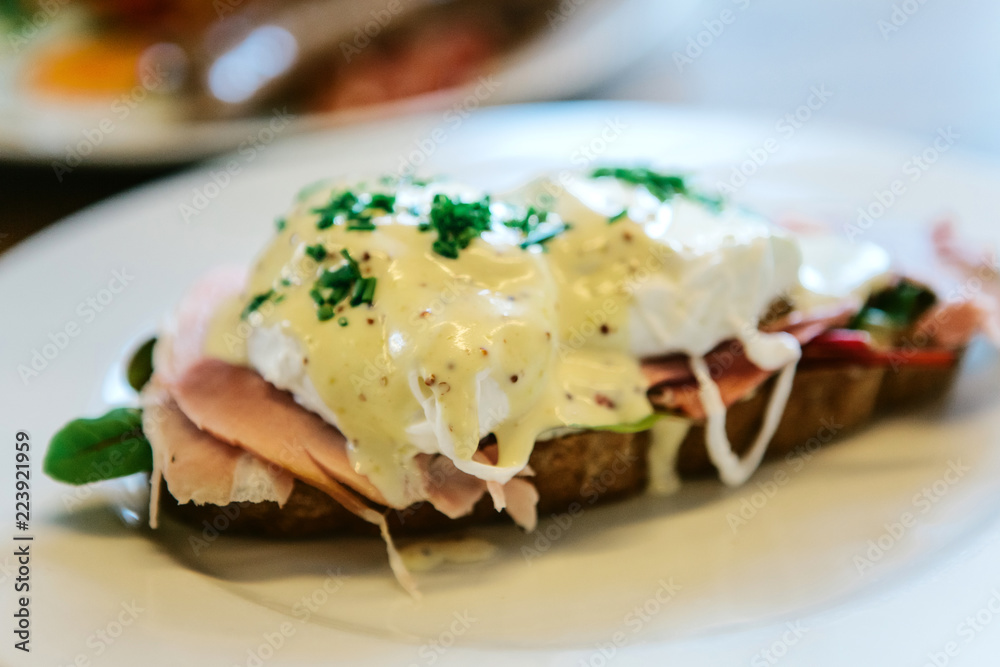 Close-up of a delicious and nutritious sandwich with poached egg.