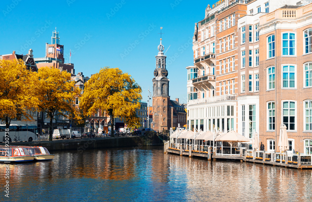 center of Amsterdam with Munt tower, Netherlands at fall