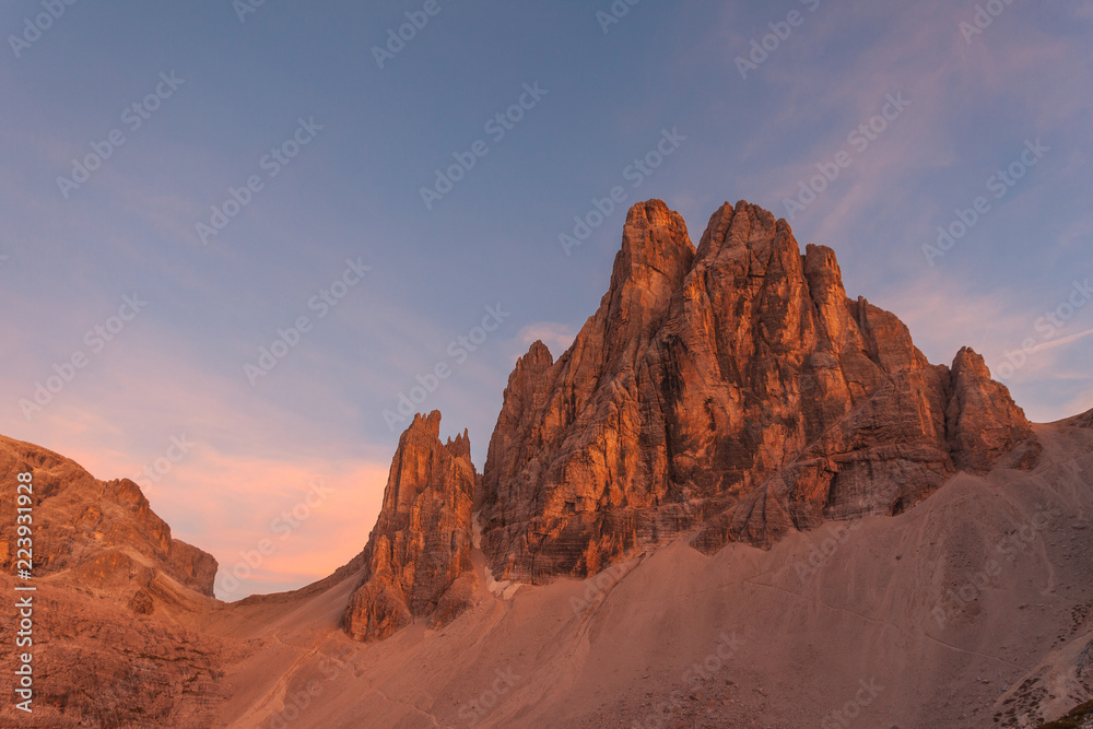 Sunset on beautiful, spiers rich, Dolomite wall, South Tyrol, Italy