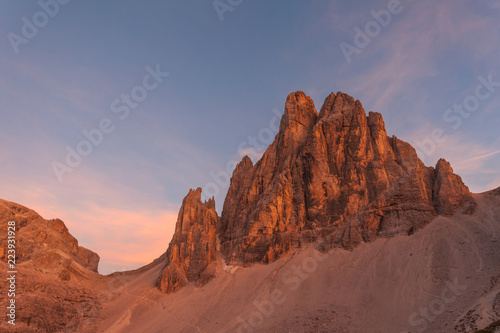 Sunset on beautiful, spiers rich, Dolomite wall, South Tyrol, Italy