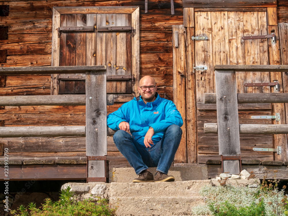 Outdoor experience at relax in front of natur wooden house Outdoor experience at relax in front of natur wooden house