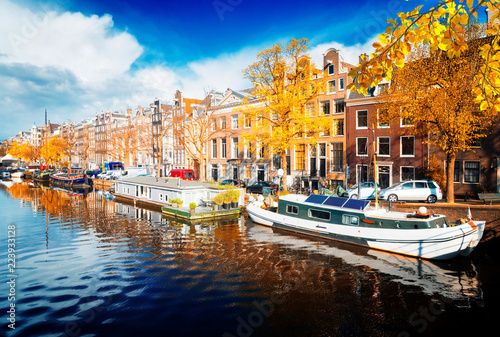 Photography embankment of Amstel canal in Amsterdam at fall day, Netherlands