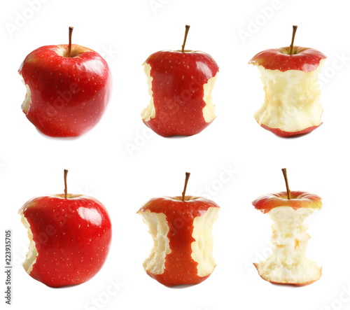 Set of delicious red apples with bite marks on white background
