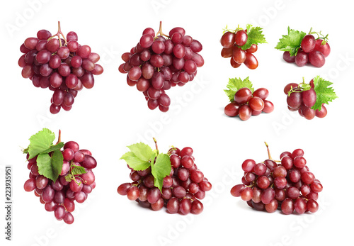 Set with juicy ripe grapes on white background