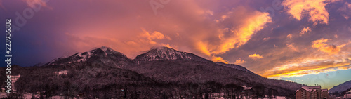 beautiful panorama of the mountains in the winter at sunset