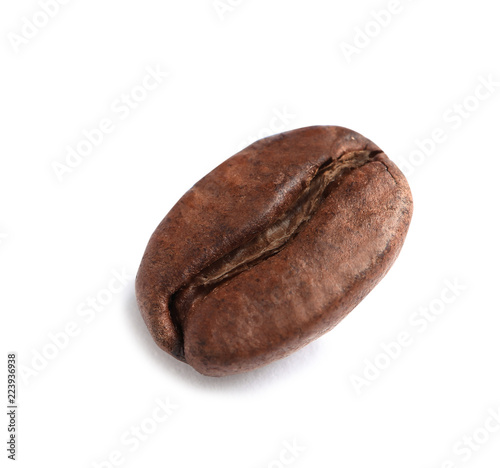 Single roasted coffee bean on white background