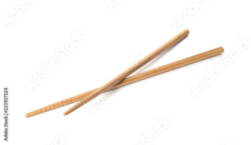 Chopsticks made of bamboo on white background