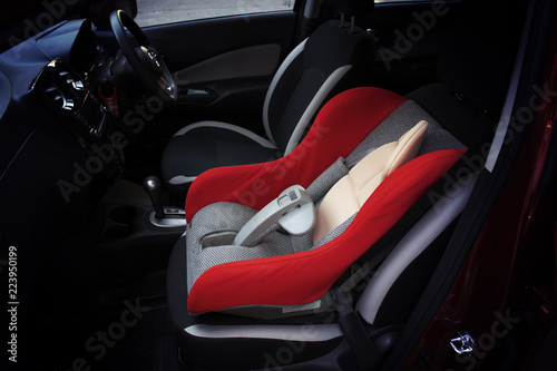 Baby car seat in a car. © BLKstudio
