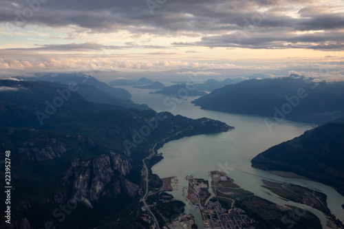 Beautiful aerial view of Howe Sound during a cloudy summer sunset. Taken near Squamish, North of Vancouver, BC, Canada.a